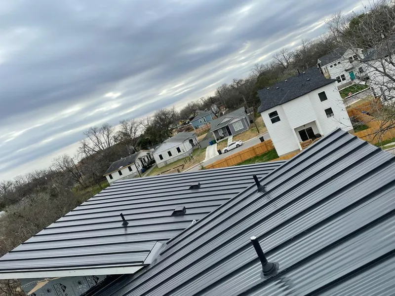 Standing seam metal roof panels with vents for Skylight Repair in Vincent